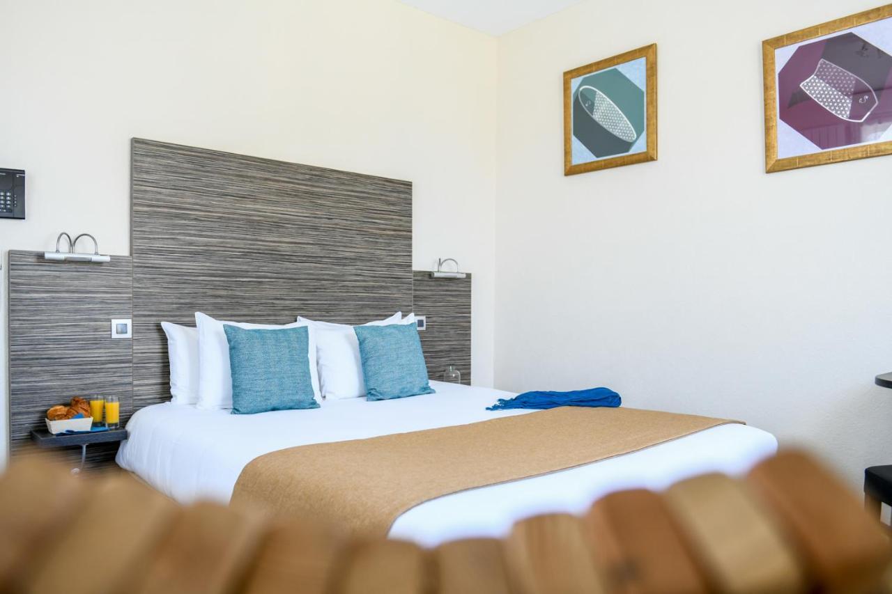 Logis Hotel De France มีมีซ็อง-ปลาจ ภายนอก รูปภาพ