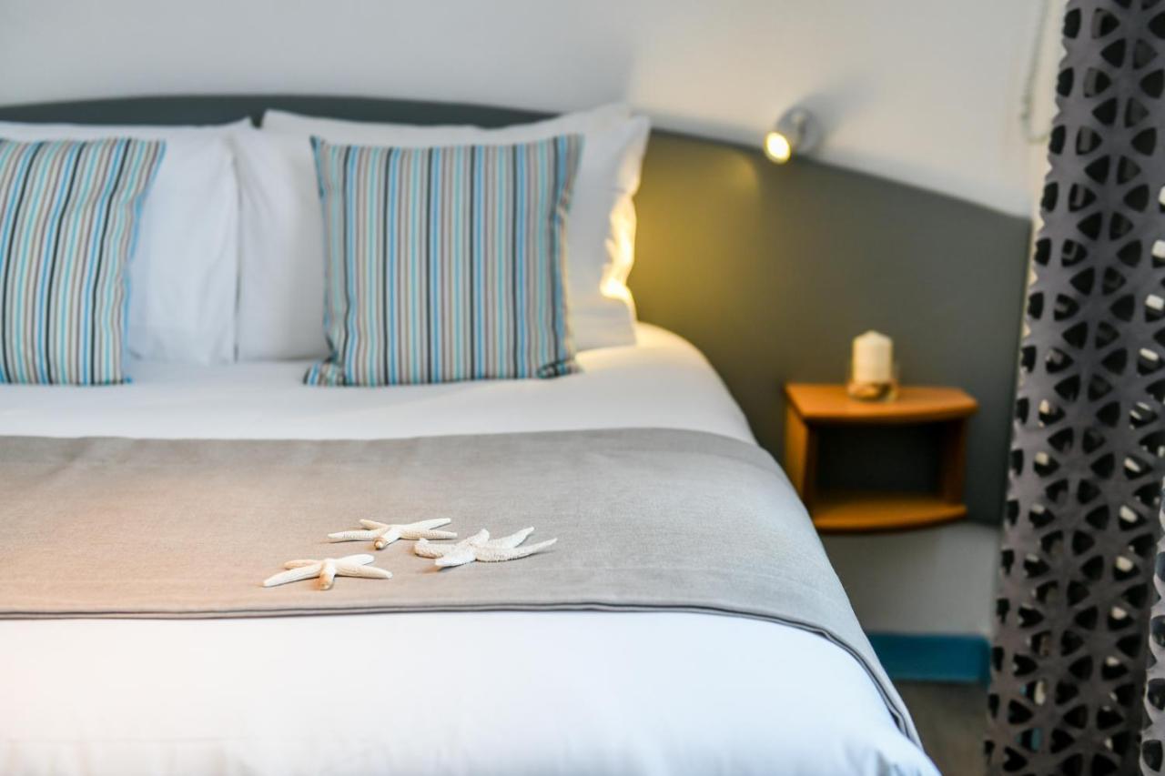 Logis Hotel De France มีมีซ็อง-ปลาจ ภายนอก รูปภาพ